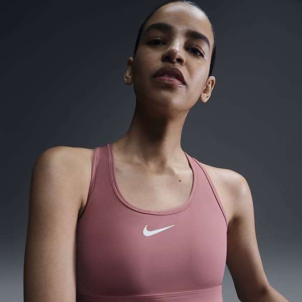 Rosa Reggiseni sportivi. Nike IT